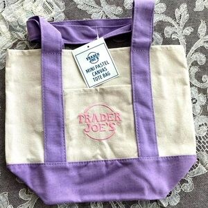 Trader Joe’s viral mini canvas tote in lavender and pink
